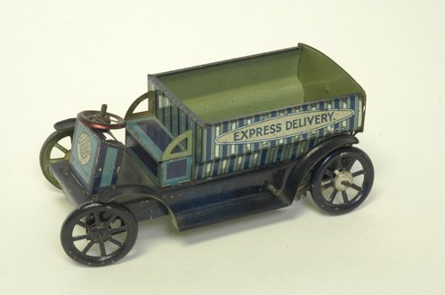 WHITARCO ''EXPRESS DELIVERY'' TRUCK: England, lithographed tin, colorful lithography, done in multi blue striping, open bed body and bench seating, clockwork driven. 5 1/4'' long.