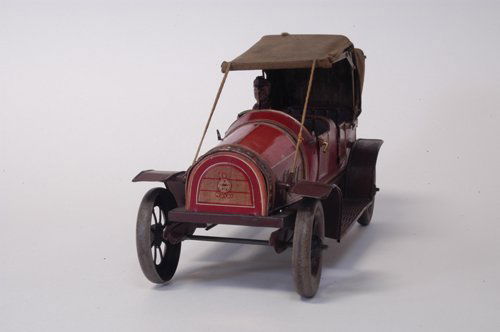 HANS EBERL TOURING AUTO: Germany, circa 1915, lithographed tin, impressive scale, cloth top model with tiedown to front bumper, seated driver, opening rear doors, full embossed running boards, spoke wheels, clockwork driven.