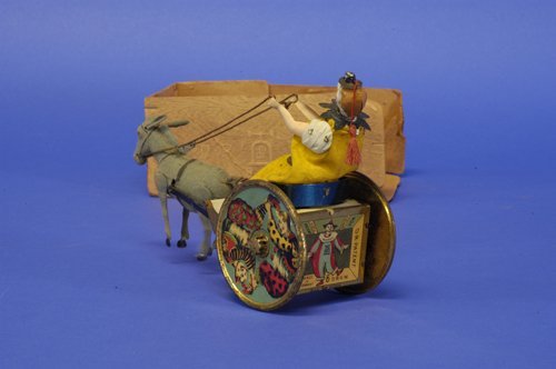 LEHMANN BOXED BALKY MULE: Germany, a signature toy for the company that actually sculpted a silhouette of toy in their office facade, lithographed tin, amusing clown figure rides comical cart, colorful wheels with strong graph