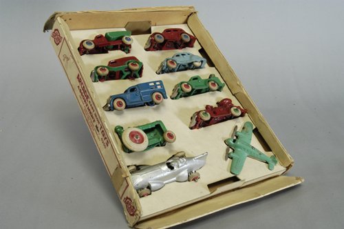 ARCADE BOXED ASSORTED TOY SET NO. 4250: Cast iron toy set includes: racer, airplane, nickel grill sedan, coupe, stake truck, van, wrecker and fire truck, together with dump truck, farm tractor and twin prop airplane, extensive set. Minor va
