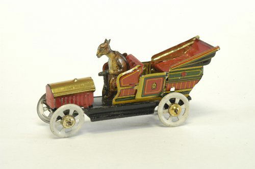 DISTLER OPEN TOURER PENNY TOY: Germany, c. 1914, lithographed tin, exaggerated top folded at rear, seated driver, bright gold finished hood, red body, spoke wheels, features classic Distler creation of kangaroo driver. 3 1/2'' long