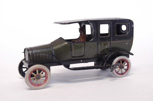 FISCHER ''ADVERTISING'' LIMOUSINE: Germany, c. 1920's, lithographed tin, done in green body, black roof reads, ''Palace Furniture,'' a WV address follows and more lettering, a little example bought by Don over 30 years ago, clockwork d