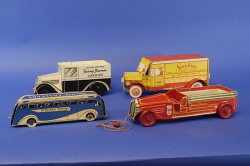 ASSORTED CARDBOARD AD CARS: An interesting group, includes Sunshine Biscuit Van, Overland Bus for Animal Crackers, and two Fanny Farmer Candy trucks, one fire engine, one van. 9'' to 10 1/2'' long.