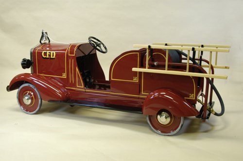 ''WHITE'' HOSE REEL FIRE ENGINE PEDAL CAR: Pressed steel original body, done in deep red, professionally restored with many custom replacement parts, very attractive, and incredible detail overall, impressive scale, large rubber hose head with