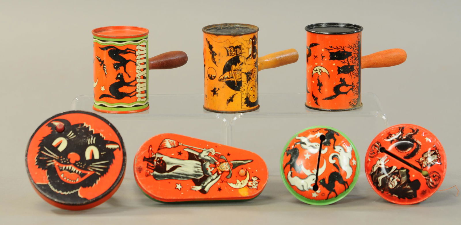 SEVEN TIN LITHO RATTLES AND RATCHETS (1 of 2)