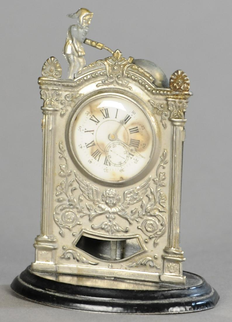 MECHANICAL ELF CLOCK PENNY TOY: 51. MECHANICAL ELF CLOCK PENNY TOY | 4" h. | Missing spring to activate clock. | $200 - $400