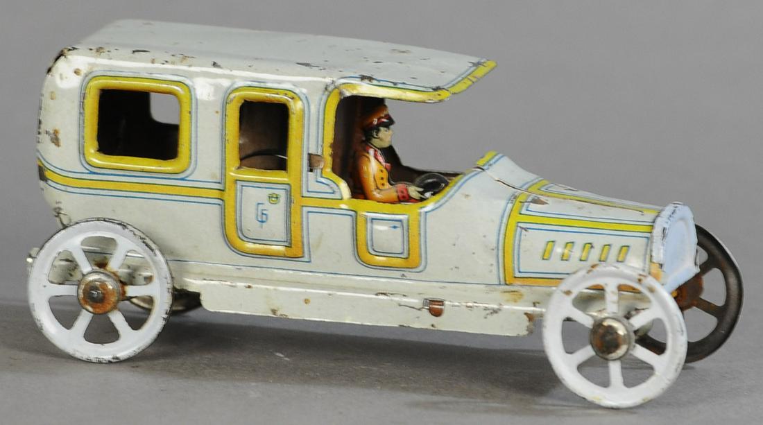 FISHER WIND-UP AUTO PENNY TOY: 57. FISHER WIND-UP AUTO PENNY TOY | Medium size with motor. | 4.5" l. | All Original Condition. | $200 - $400