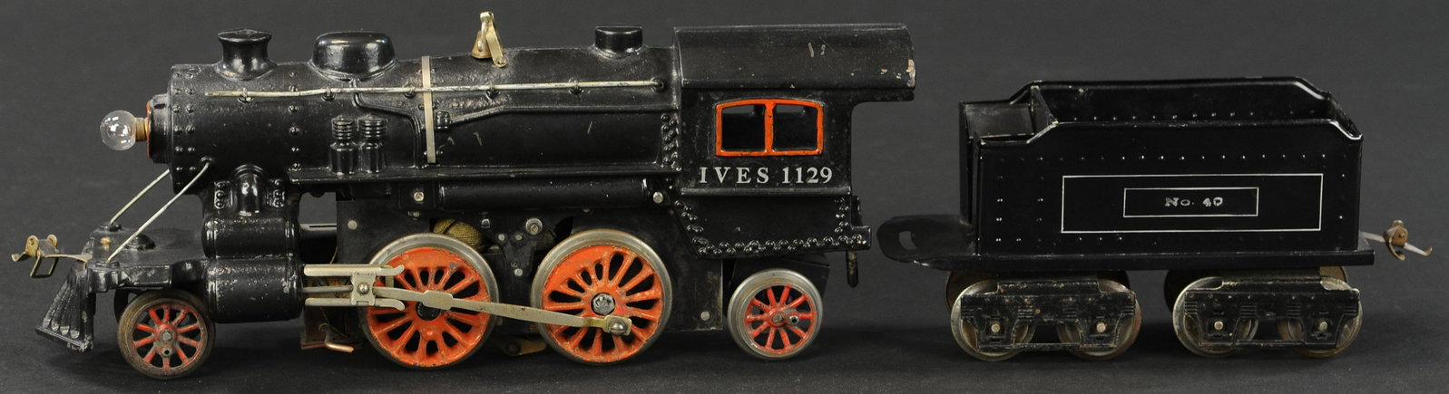 IVES GAUGE 1 #1129 LOCOMOTIVE: 187. IVES GAUGE 1 #1129 LOCOMOTIVE | Gauge 1, electric. | 20" l. | Restored. | $400 - $800