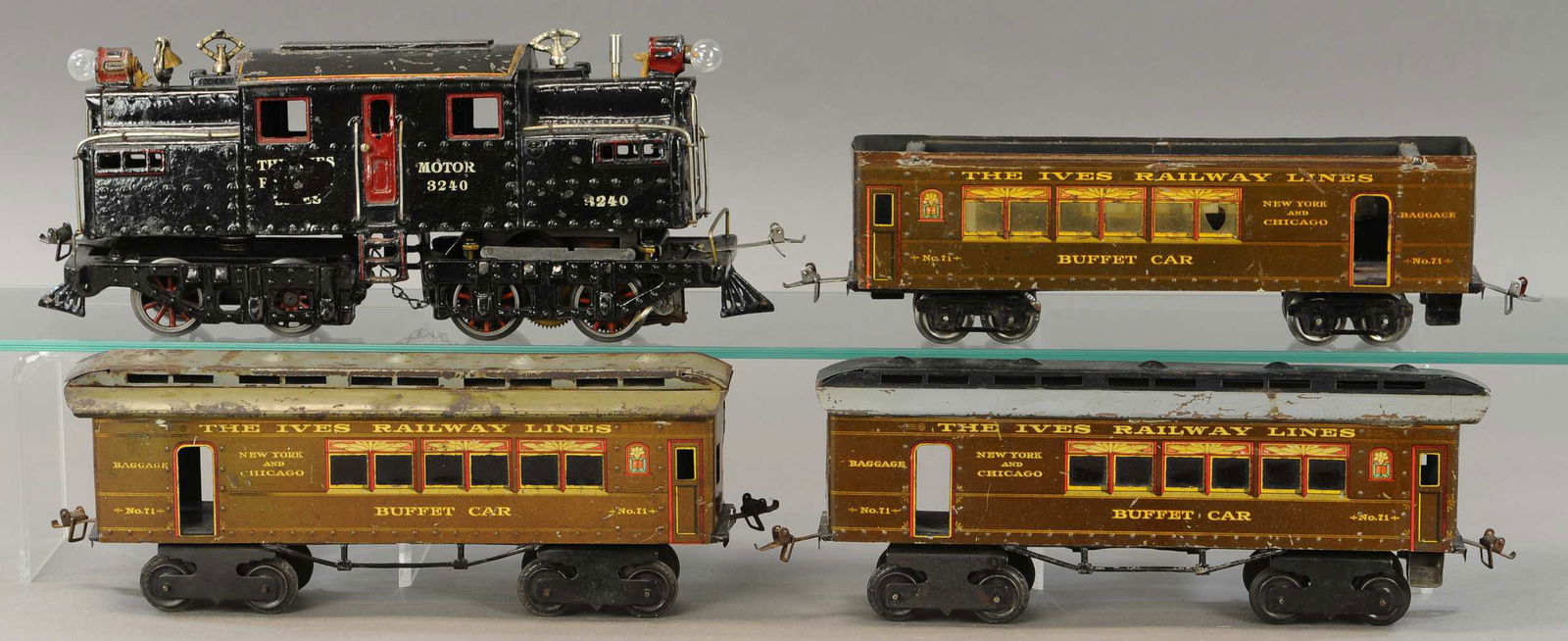 IVES 3240 LOCOMOTIVE & PASSENGER CARS: 202. IVES 3240 LOCOMOTIVE & PASSENGER CARS | Gauge 1, electric. | One car has had O gauge trucks installed, mismatched trucks on Loco, loco has some minor touch-ups, one coach is missing roof. | $250
