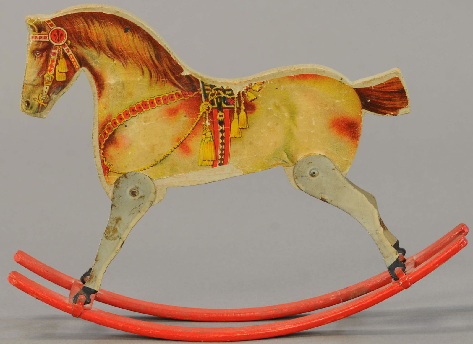 GIBBS ROCKING HORSE: 288. GIBBS ROCKING HORSE | 9" | Missing rider figure, lithography on horse in All Original Condition. | $50 - $100