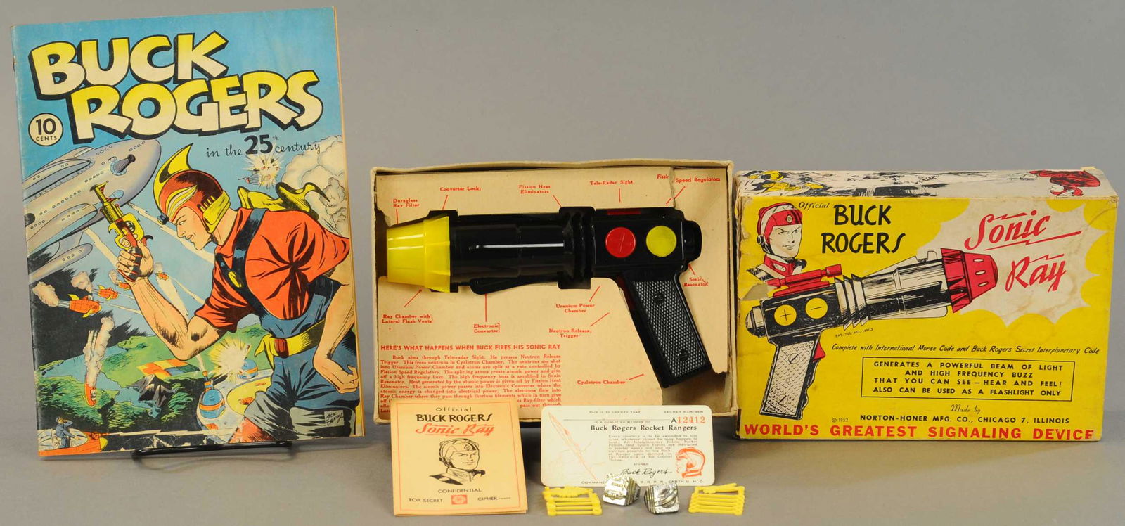 BUCK ROGERS SPACE GUN W/ COMIC BOOK: 333. BUCK ROGERS SPACE GUN W/ COMIC BOOK | 7" | All Original Condition. | $150 - $300