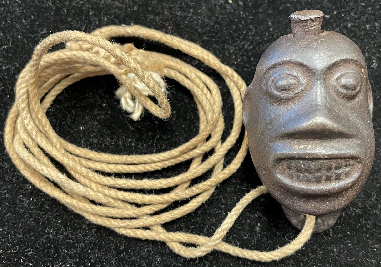 THE CANNIBAL HEAD CAP BOMB: 265. THE CANNIBAL HEAD CAP BOMB | Provenance: The Schroeder Collection. | 3" h. | (Excellent Condition) | $600 - $900