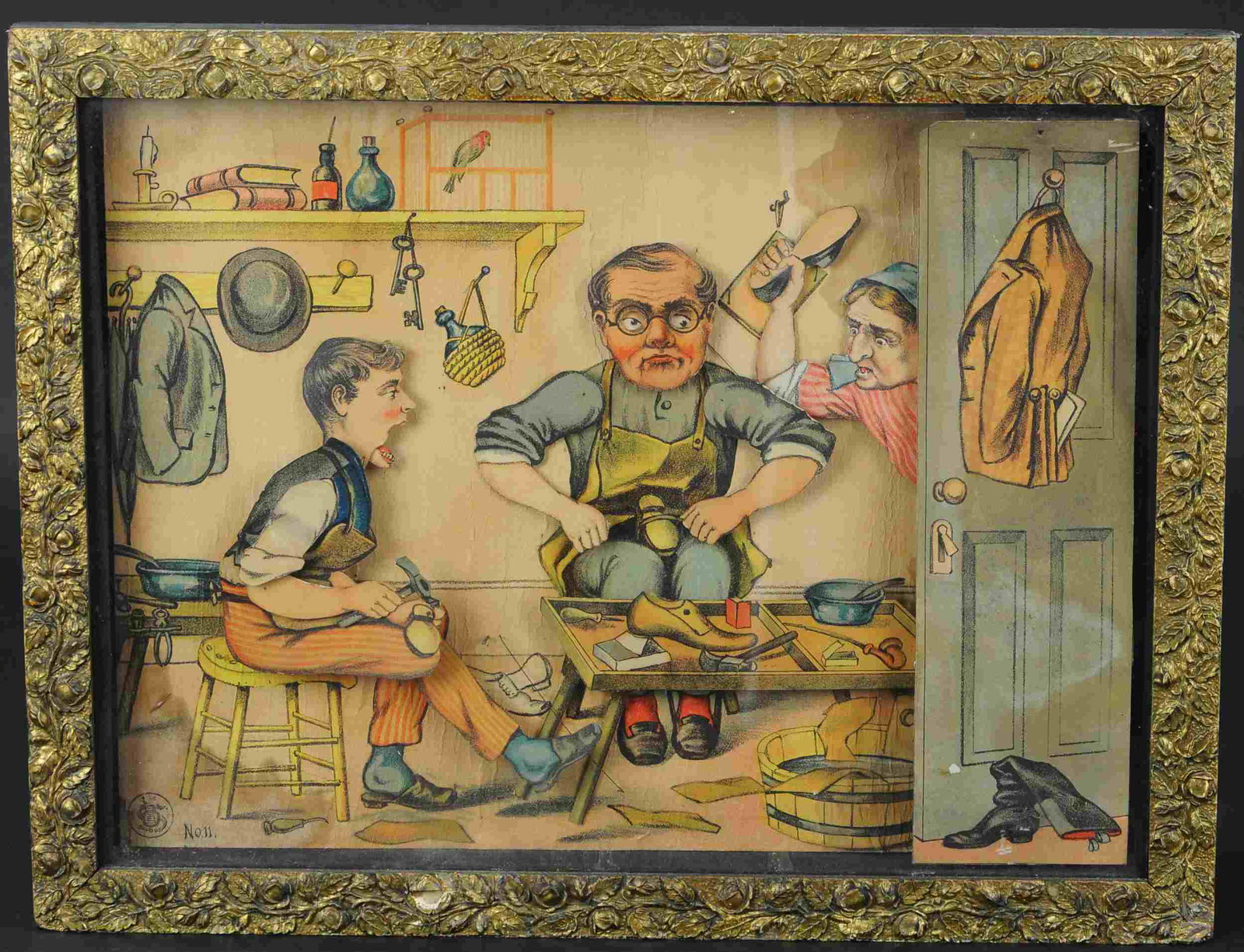 SCHOENHUT COBBLER MECHANICAL PICTURE: 322. SCHOENHUT COBBLER MECHANICAL PICTURE | Paper lithographed scene of a cobbler's workshop in gilded frame, clockwork animation depicts the cobbler and his apprentice working on shoes as a woman app
