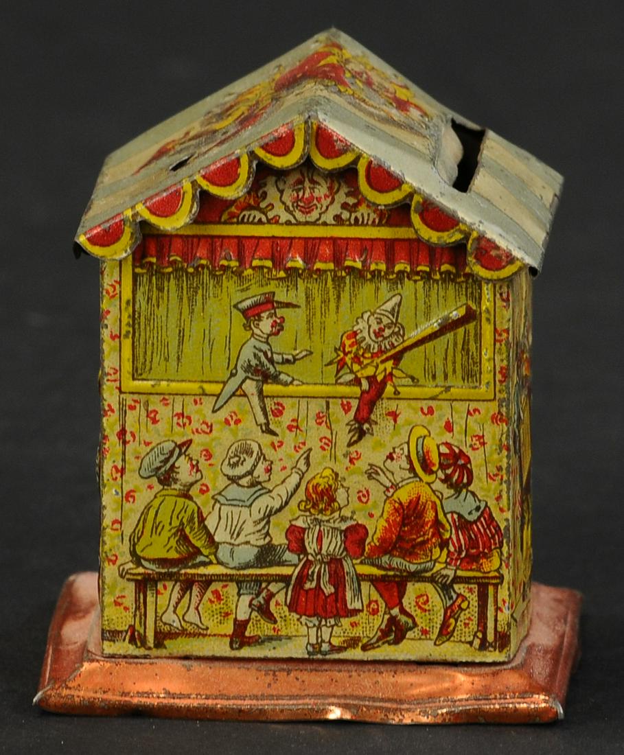 GERMAN PUNCH AND JUDY BANK PENNY TOY: 379. GERMAN PUNCH AND JUDY BANK PENNY TOY | Provenance: The Schroeder Collection. | 3" h. | (Excellent to Pristine Condition) | $400 - $600
