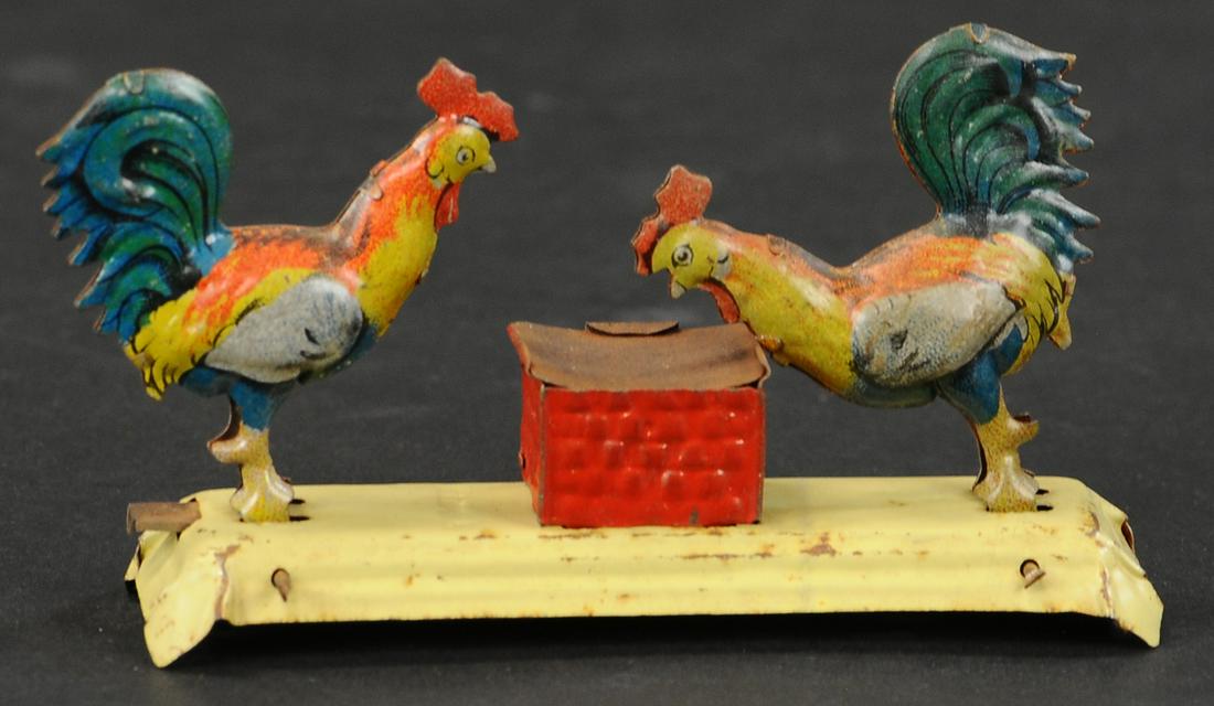 MEIER PECKING CHICKENS PENNY TOY: 396. MEIER PECKING CHICKENS PENNY TOY | Provenance: The Schroeder Collection. | 4" l. | (Very Good to Excellent Condition) | $200 - $400