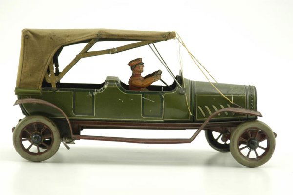 HANS EBERL TOURING CAR: Germany, c. late teens, lithographed tin, done in green overall, features cloth fold-down top, brown full running boards, seated driver and clockwork drive, a very popular style for the well-to-do in