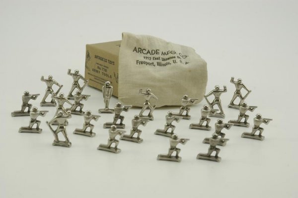 ARCADE BOXED MARINE FIGURES: c. 1940, Midget marine figures, all nickeled cast iron, includes 23 figures, comes with Arcade "Army Tools" box, figures are bagged in original Arcade bag. Each 1 1/4" h.