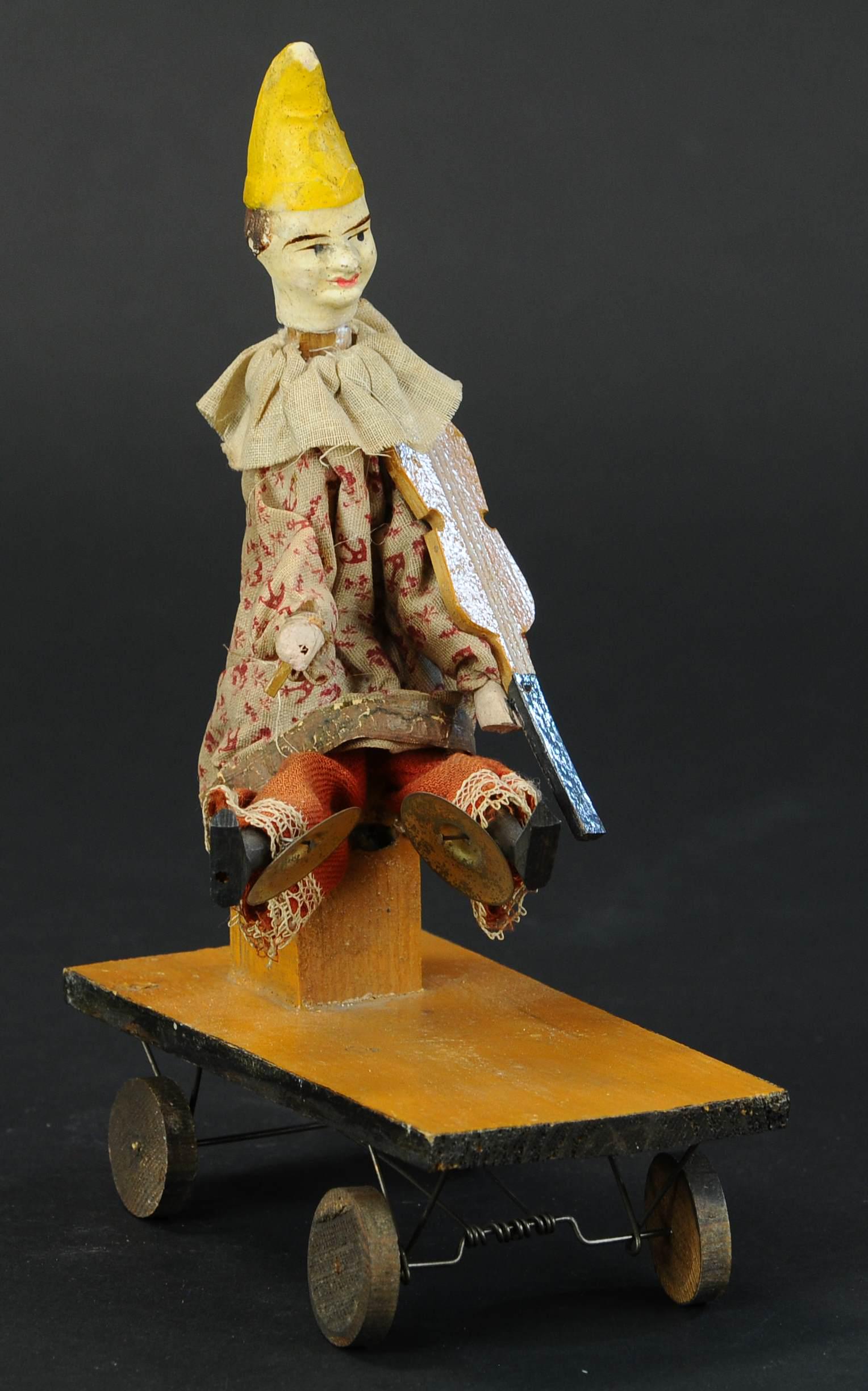 HARLEQUIN PLAYING FIDDLE MECHANICAL TOY (1 of 4)