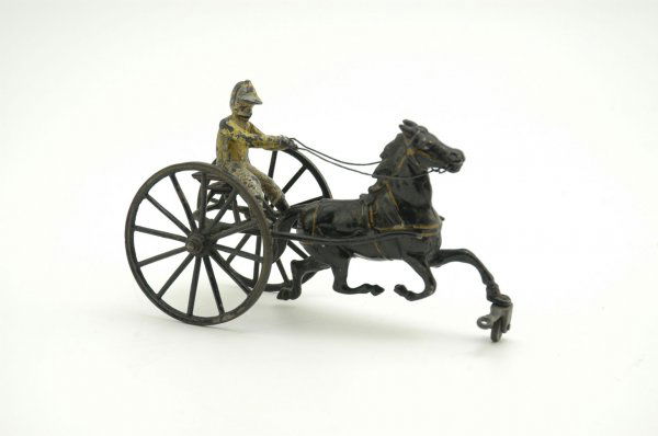 PRATT & LETCHWORTH SULKY: Cast iron, black sulky, embossed seating, large spoke wheels with gold trim, seated jockey, drawn by black horse. 8" l.