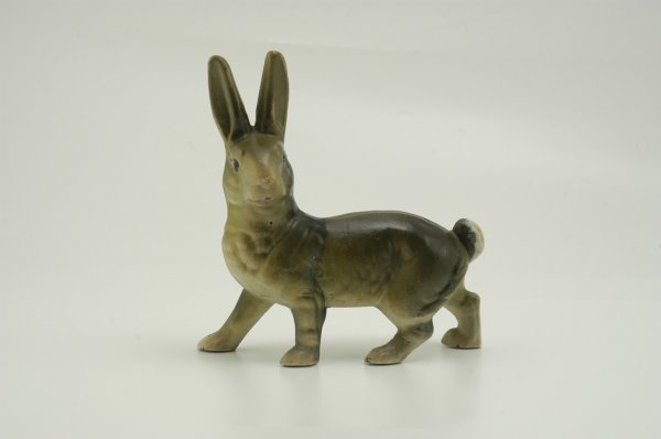 RABBIT DOORSTOP: Full figure, facing forward example, realistic size and detail, very alert stance and expression; great overall coloring w/classic white cottontail showing. 9" h. x 8 1/2" w.