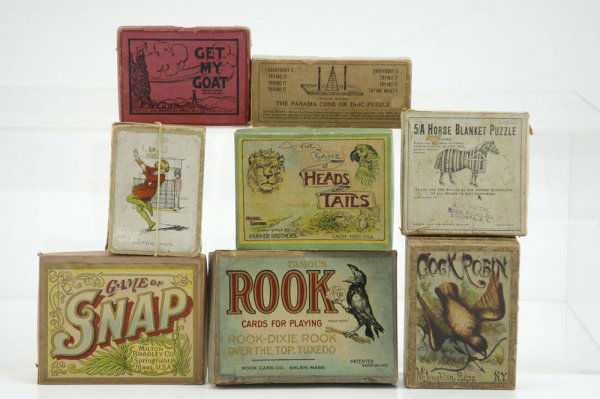 LOT OF EIGHT GAMES: Includes card games like Peter Pan and Rook, along with puzzle games such as 5/A Horse Puzzle and Get My Goat, most appear complete. Largest 5 3/8" x 3 7/8".