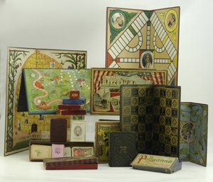 LARGE LOT OF VINTAGE GAMES AND GAME BOARDS: Includes various early games such as Peter Coddles Trip to New York, Checkered Game of Life, and many loose, colorful playing boards and card sets, some complete. Largest board, 18 3/4" x 18 3/4".