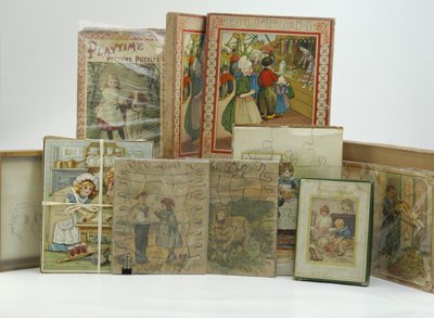 LARGE ASSORTED PUZZLE LOT: Great assortment of mostly complete puzzles, some unboxed, all with charming children's themes, total of eleven items. Largest, 10 1/4" x 13 1/4".