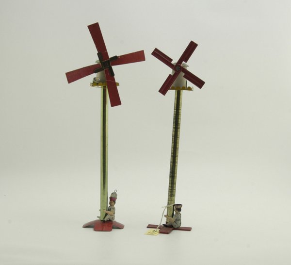 TWO LEHMANN "GUSTAV THE MILLER" TOYS: Germany, two versions, the first with cardboard blades, and a later example w/tinplate blades from the Atlanta Toy Museum. 19" h.