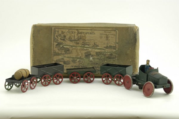 BOXED VICTOR BONNET "LES AUTO TRANSPORTS": France, very scarce boxed example, set features open cab auto w/clockwork mechanism which pulls two open box cargo beds, flat coal bed trailer, and flat bed trailer carrying barrel; a very scarce item
