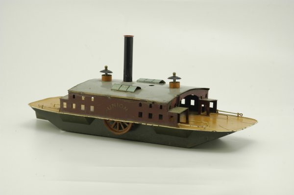 BING "UNION" FERRY: Germany, flat platform ferry, as used to transport people and vehicles, removable stack, sides read "Union," hand painted overall, one paddle wheel re-soldered and loose, wear to paint, but still disp