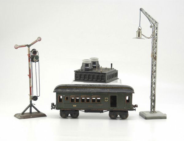GROUPING OF MARKLIN TRAIN ACCESSORIES: Includes semaphore, hand cranked light with original stock number "Post" car, and light accessory. Tall light 17" h.