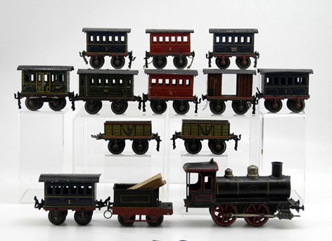MARKLIN TRAIN CARS: Germany, includes a large grouping of "O" gauge passenger cars, hand painted in multi-colors, together with 0-4-0 clockwork locomotive and tender, set comes as found, playwear is normal, paint flaking
