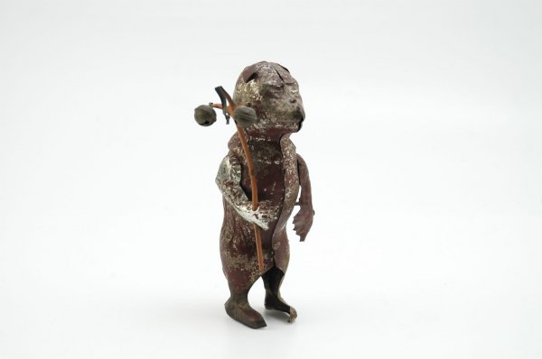 MECHANICAL DANCING BEAR: Gunthermann, Germany, hand painted in brown, tin bear able to wobble about when clockwork is activated. 8" h.