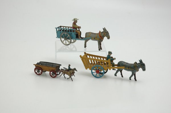 LOT OF THREE OPEN WAGON PENNY TOY CARTS