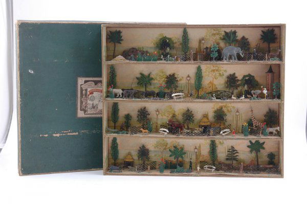BOXED DIORAMA SET: Mignot, France, incredibly detailed four tiered shelf diorama set, features lead figures, hand painted overall, paper litho background, depicts animals and people. 18 1/2" x 21 1/2"