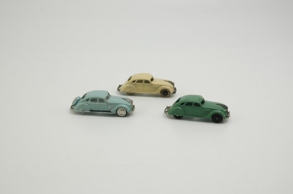 LOT OF THREE MECCANO DINKY AIRFLOWS: Die-cast examples, includes green, yellow and re-painted blue example, each with separate cast grille and bumper. 4" l.