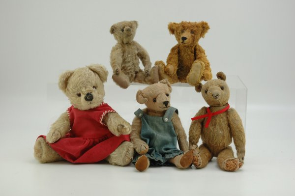 LOT OF FIVE ASSORTED MOHAIR BEARS: The smallest beige bear is probably an early Steiff but is unmarked and has had pads replaced and nose and stitching sparse, although he has "shoe button" eyes. The gold plush bear is a newer artist b