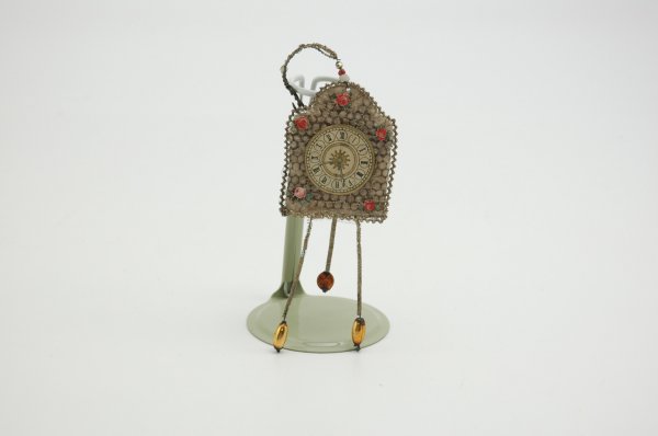 SEBNITZ WALL CLOCK ORNAMENT: Interesting design with Dresden clock face and scrap roses as accents; tinsel wires lead to three golden glass ball pendulums beneath. 5 3/4" h.