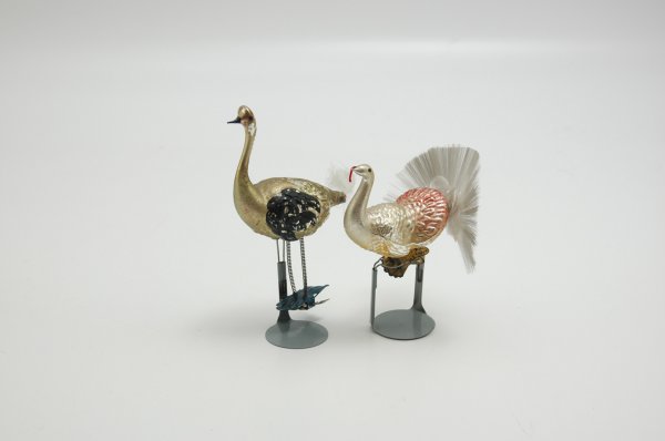 LOT OF TWO BIRD ORNAMENTS: Features a gold ostrich* with black wings and feather tail along with a gold and pink turkey; both done in clip-on style. *Ostrich Book Example. 3 1/2" - 6" t.