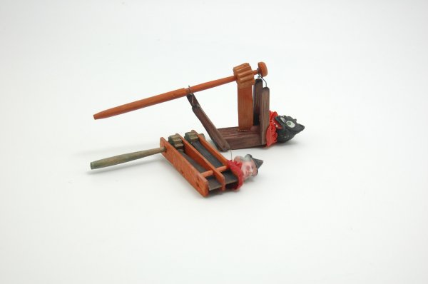 TWO HALLOWEEN NOISEMAKERS: Germany, one being a black composition head cat on wooden body and handle along with a composition witch head on a wooden orange frame with green handle. 6 1/2" to 9" h.