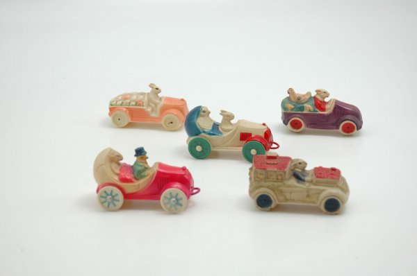 GROUP OF FIVE EASTER BUNNIES DRIVING AUTOMOBILES