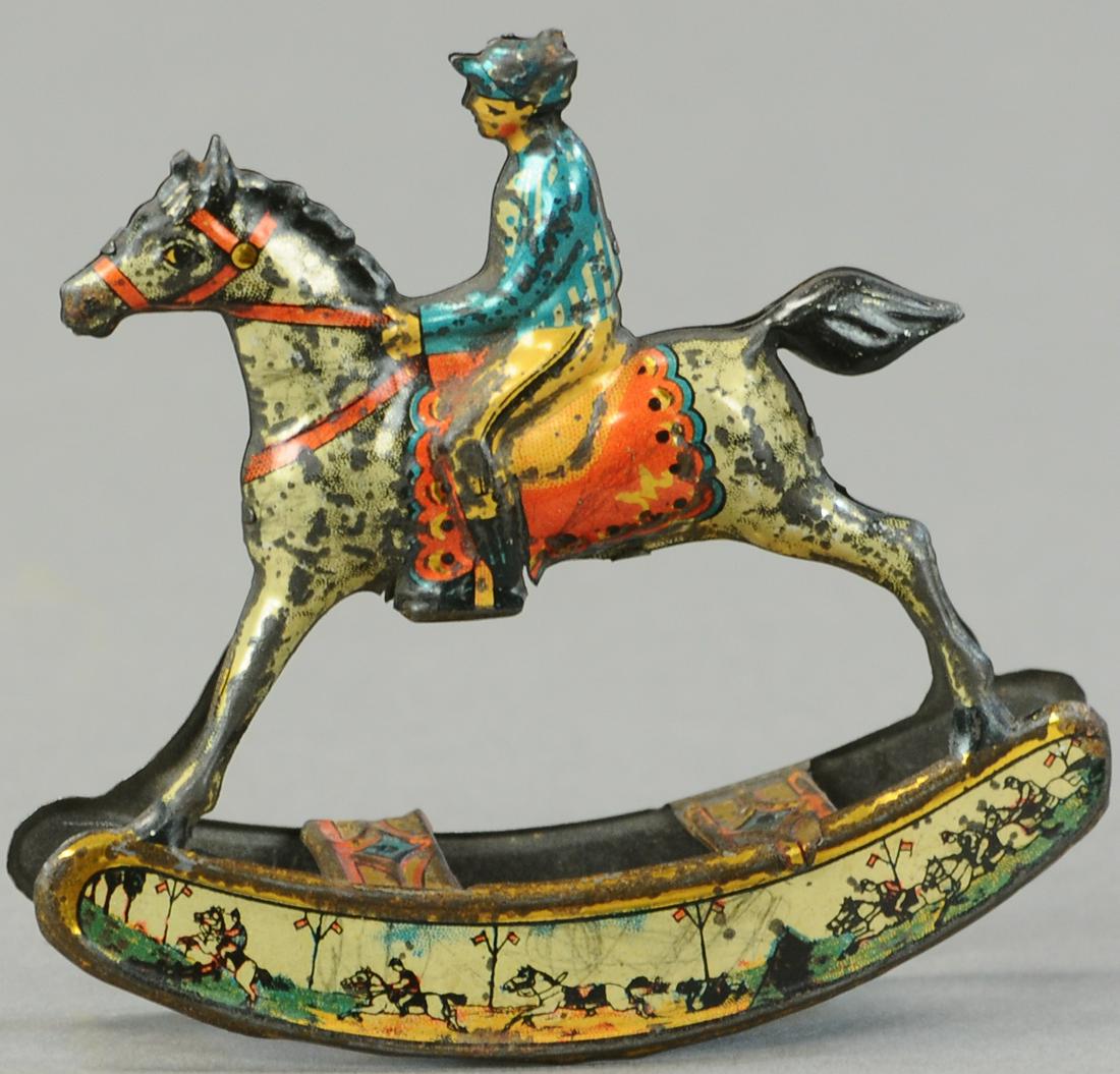 MEIER ROCKING HORSE JOCKEY PENNY TOY: 1100. MEIER ROCKING HORSE JOCKEY PENNY TOY | 3.5" l. | All Original Condition. | $100 - $200