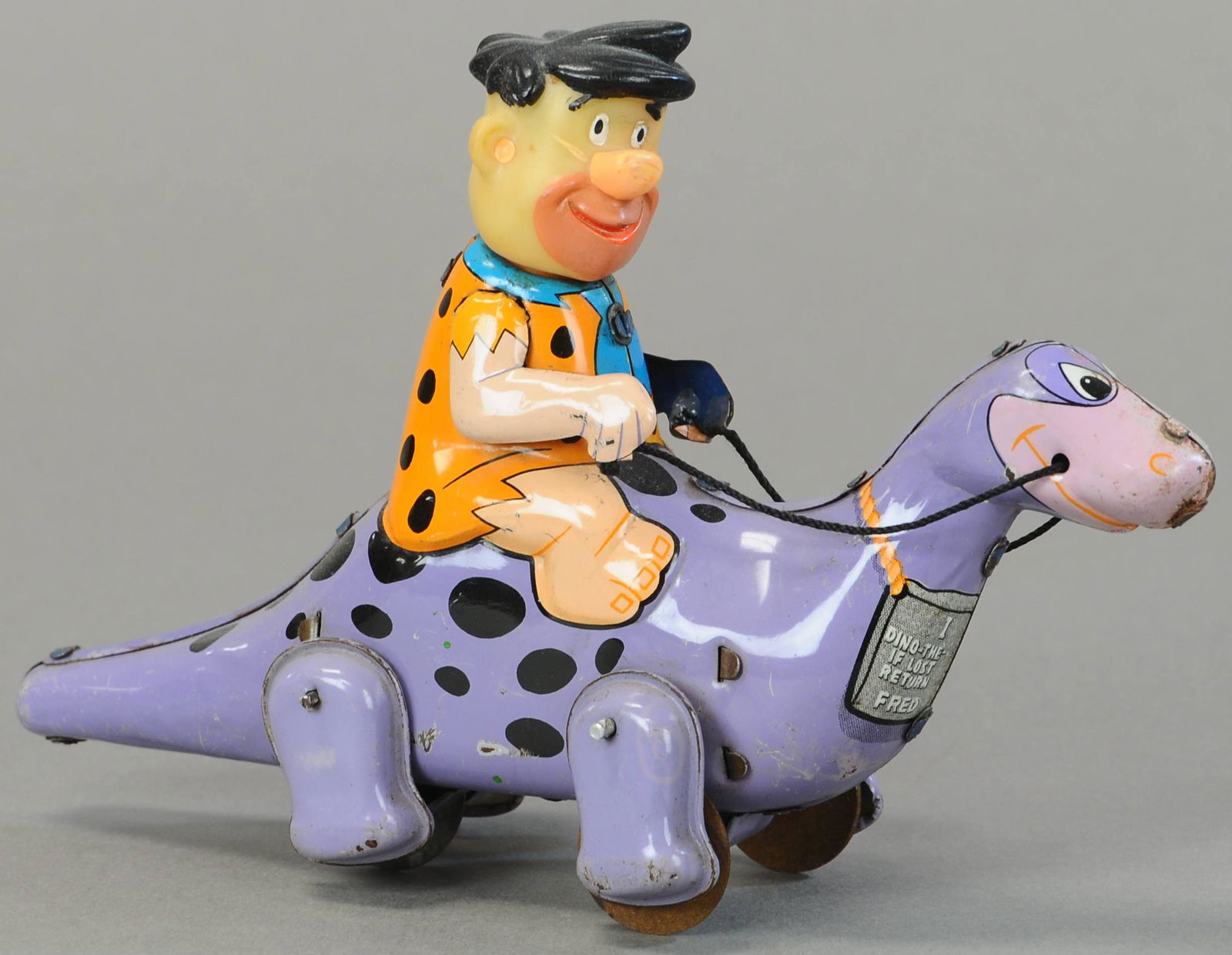 LINEMAR FRED FLINSTONE RIDING DINO (1 of 3)