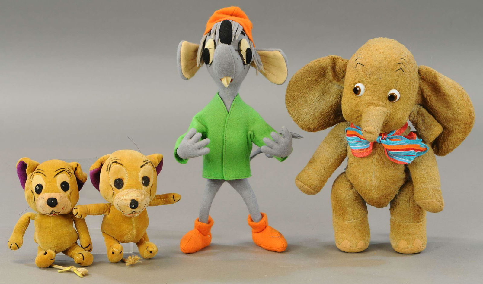 FOUR STUFFED FIGURES (1 of 2)