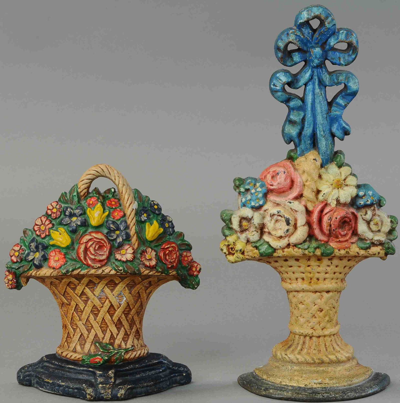 TWO TALL FLOWER BASKET DOORSTOPS (1 of 2)