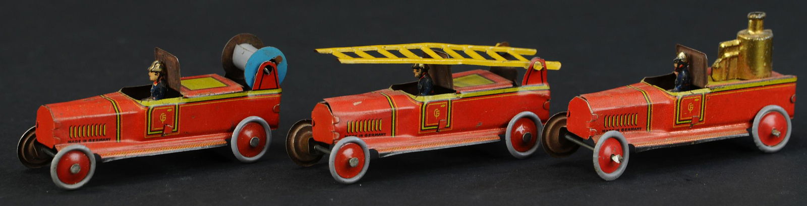 THREE FISCHER FIRE ENGINE PENNY TOYS (1 of 3)