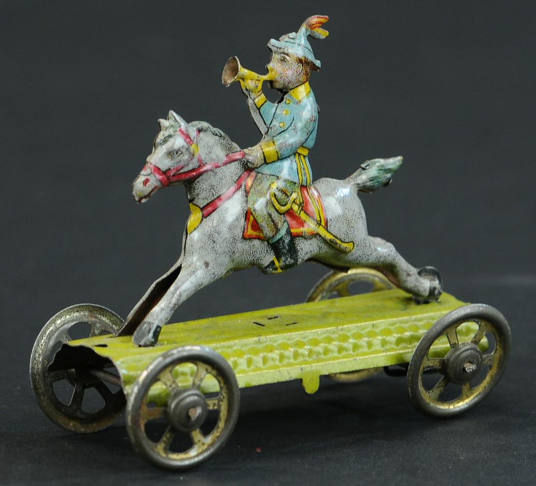 MEIER BUGLE BOY ON HORSE PENNY TOY (1 of 3)