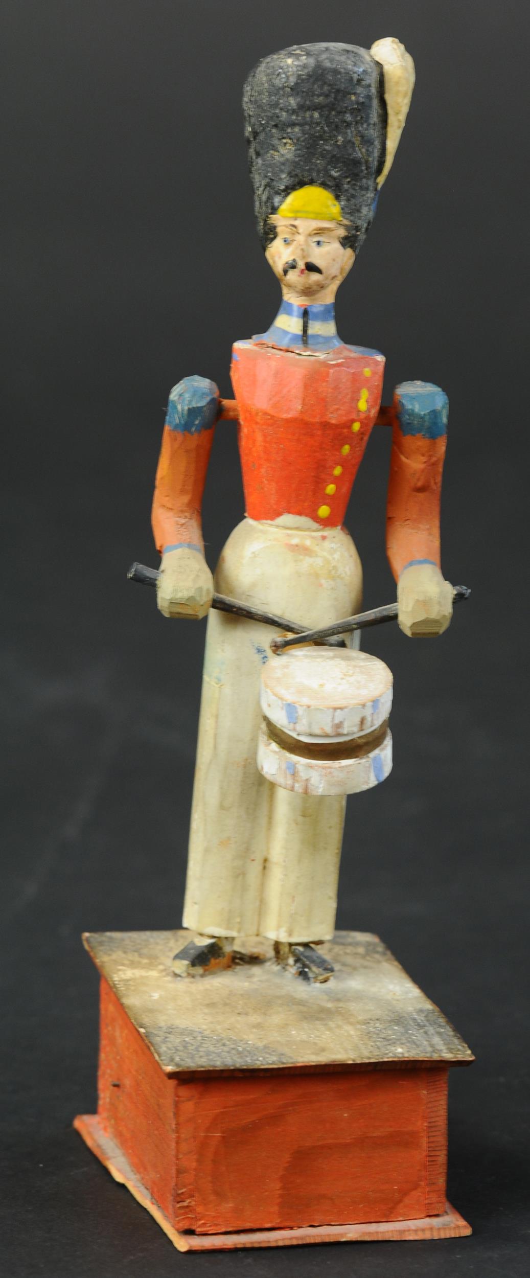 ERZGEBIRGE COLORFUL DRUMMER CRANK TOY: 161. ERZGEBIRGE COLORFUL DRUMMER CRANK TOY | When the crank is turned the drummer plays the drums. String which activates the arms has been disconnected from crank, head has been re-glued, arms have b