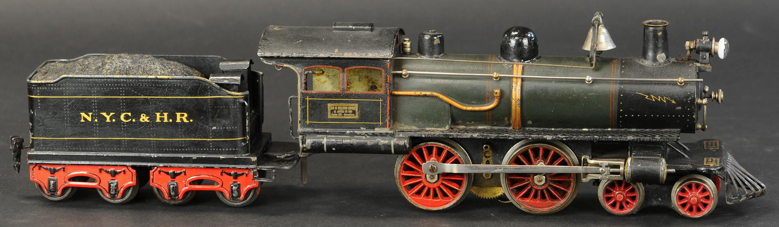 MARKLIN 4-4-0 HIGH VOLTAGE ELECTRIC LOCOMOTIVE: 728. MARKLIN 4-4-0 HIGH VOLTAGE ELECTRIC LOCOMOTIVE | Gauge 1, hand painted, high voltage electric American outline 4-4-0, plate on side of cab reads "Hijo de Guillermo Leopold el Ancora de Oro Cortes