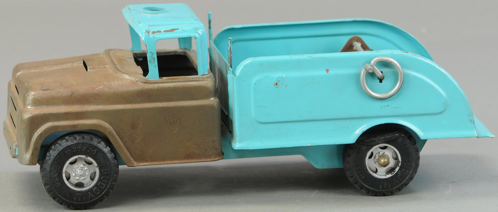 BUDDY L WRECKER TRUCK: 60. BUDDY L WRECKER TRUCK | From the Butch Buss Collection. | 14.5" l. | Missing boom for wrecker crane, otherwise in All Original condition. | $200 - $400